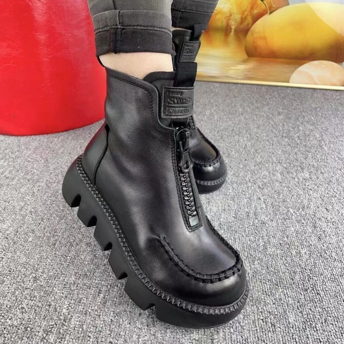 Bottes en cuir zippées à la mode